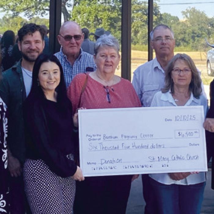 St. Mary’s check presentation to Brenham Pregnancy Center.