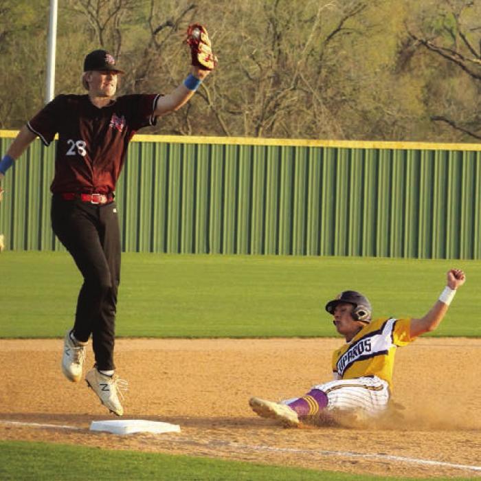 La Grange’s Hunter Sabo slides in safely to third base Tuesday. Photo by Jeff Wick