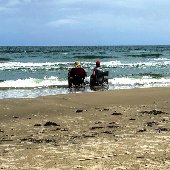 My mom and dad enjoying a day at the beach on Mustang Island. Photo by Adam Behlen