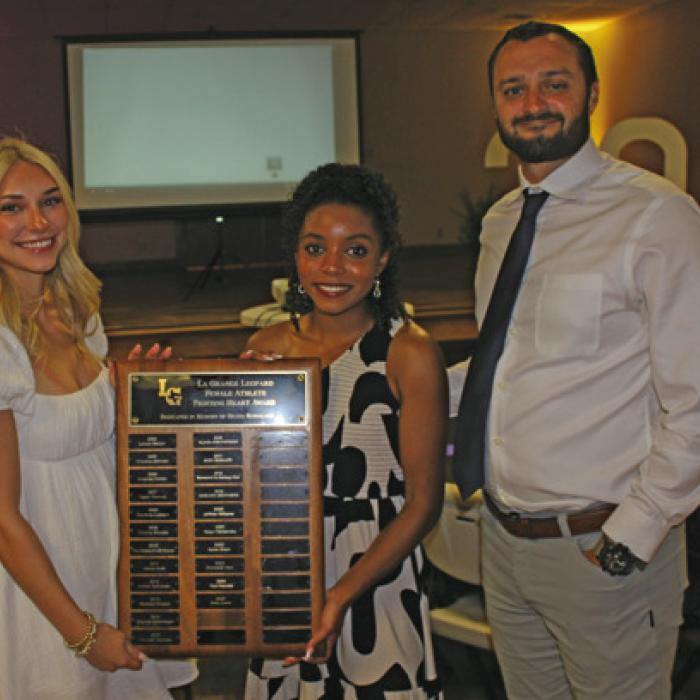 The La Grange Female Fighting Heart Award winners were, left, Kylie Trlicek and center, Diamond McKenzie, presented by Coach Ryan O’Neal.