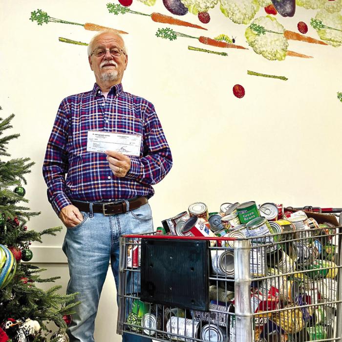 AMEN Receives Donation Holy Smokers, NHS