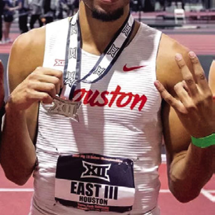 La Grange’s Trey East III holds up his 4x400 relay silver medal at the Big 12 Indoor Championships last week in Lubbock.