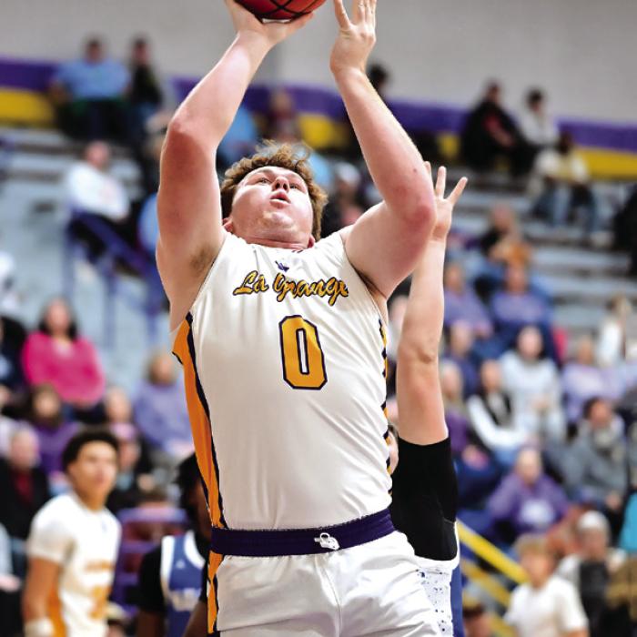 Oliver Gunn puts two on the board the Leopards against Navasota Friday night in La Grange. Photo by Stephanie Steinhauser