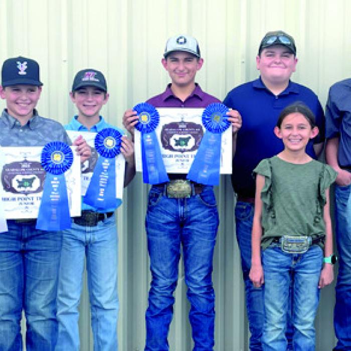 Pictured front from left: Emma Zweschper and Rowdy Guenther; back row: Abraham McBride, Hudson Holub, Crockett Guenther, Dylan Zweschper, Rilan Karisch, Holden Holub, and Rheagan Karisch.