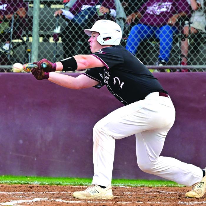 Henri Vincik lays down a bunt for Flatonia in Tuesday night’s district win over Ganado. Photo By Stephanie Steinhauser
