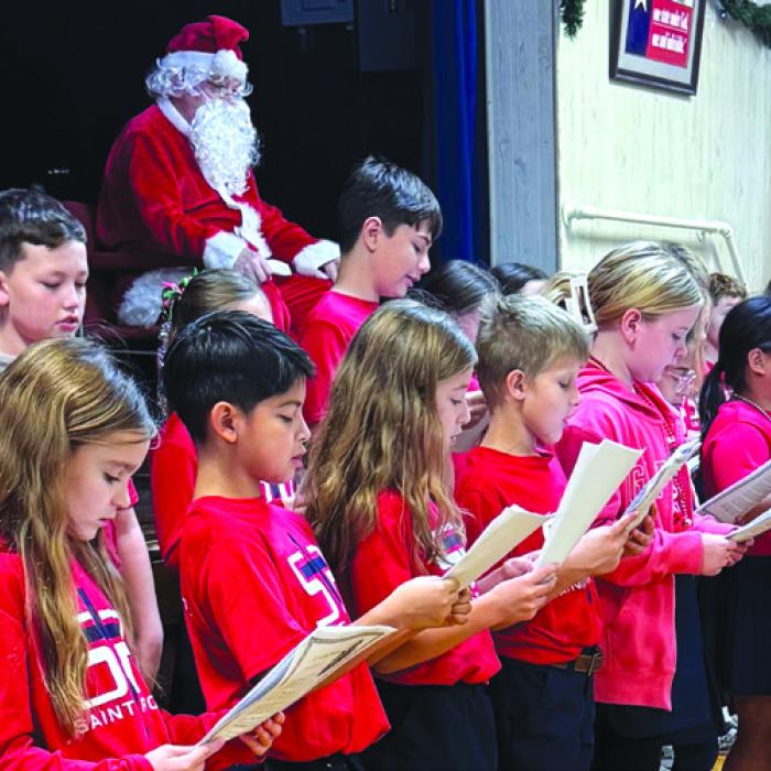 The second, third and fourth grade student from St. Rose entertained us with music and laughter.