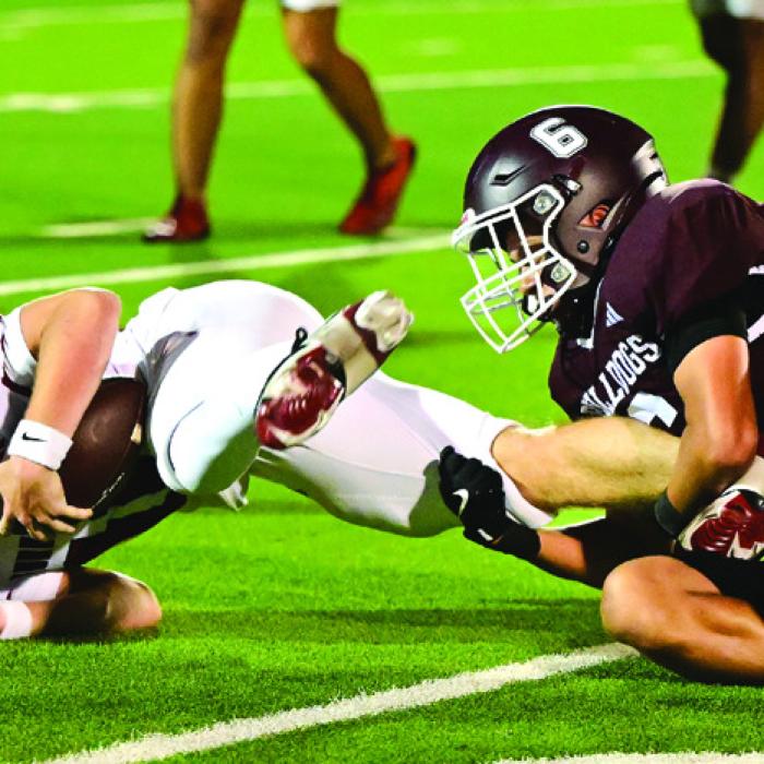 Freddy Manzano trips up a Three Rivers ball carrier in Friday night’s game in Flatonia. Photo by Stephanie Steinhauser