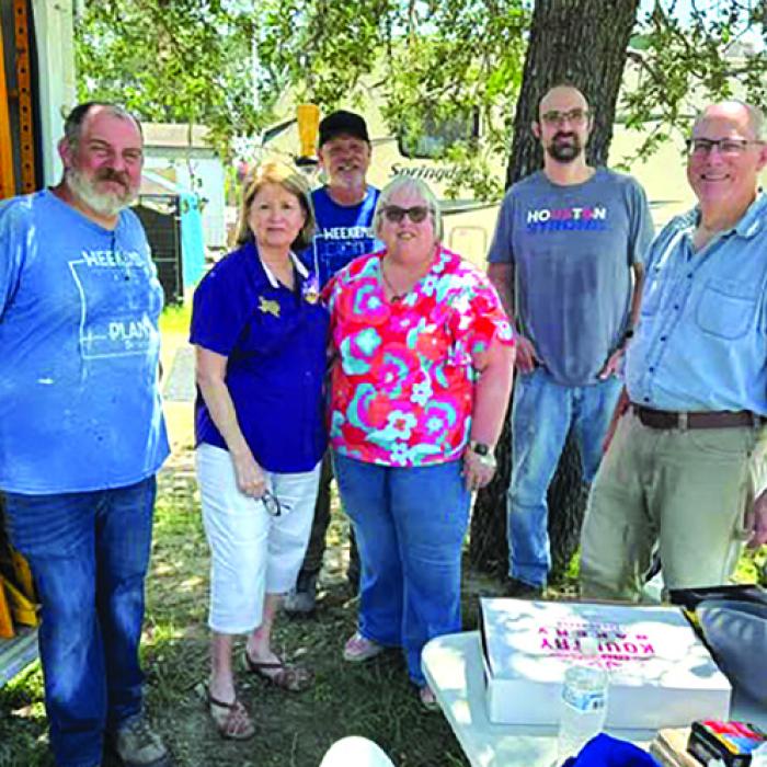 Kathleen Svatek, Kathy Carpenter, and Fayette County Habitat for Humanity volunteers.