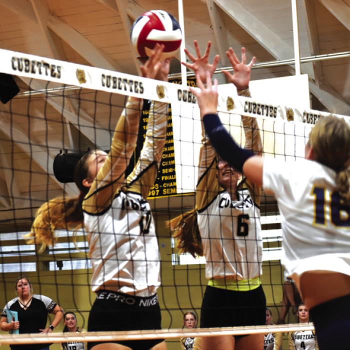 Round Top-Carmine’s Rebekah Sacks and Caydan Nelius jump to block this shot in Friday’s match. Photo by Paul Kipp