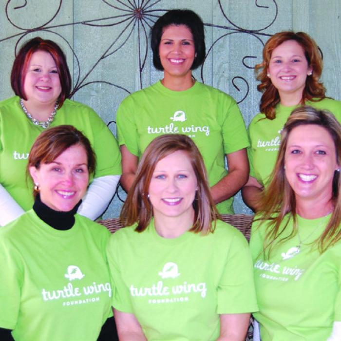 The Turtle Wing Foundation Founding Board, back to front, left to right: Michele Siniard, Delia Hernandez, Stacy Oeding, Gigi Marburger, DeeAnn Hooper, Staci Fike.