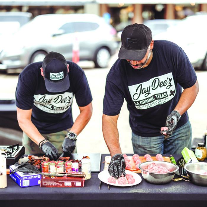 John Daniel and Leroy East of the Jay Dee’z team work on their burgers, which were eventually were crowned the winners of the 2026 Texas Burger Bash.