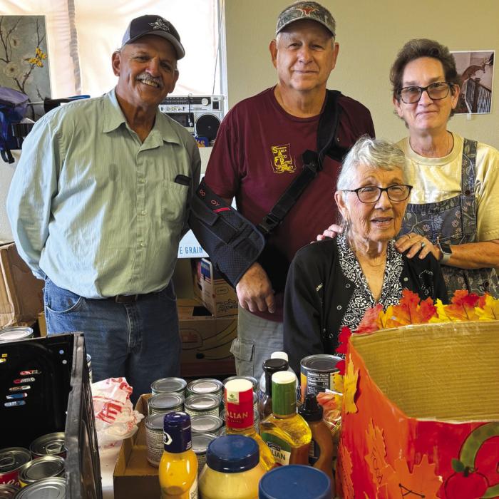 Stephanie Shroyer dropped off food at the Food Pantry in Schulenburg last month. Pictured are Mike Scheindler, Jack Neisner, and Delores Michalke, all with the food pantry, and Stephanie Shroyer.