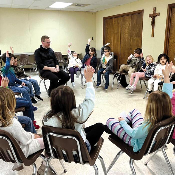 Father Chris Smith spent time with each of the classes talking about vocations and heaven. They contemplated and discussed religious artwork and even played a few games together.