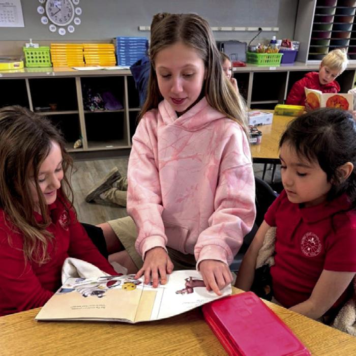 Our older students took time to read to the younger grades and share in the fun of storytime.