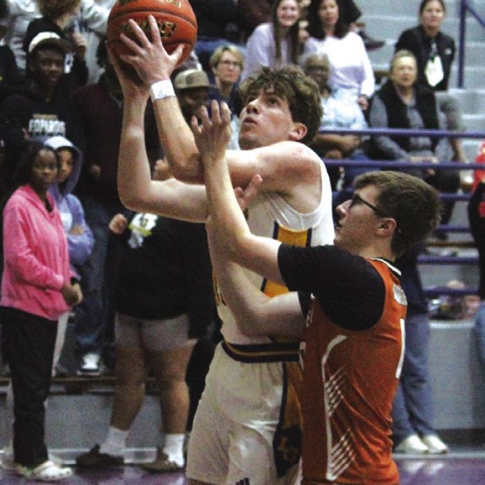 La Grange’s Cole Collier drives to the basket in Tuesday’s victory. Photo by Jeff Wick