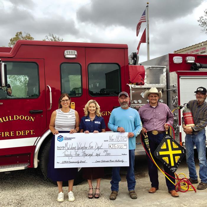 LCRA representatives present a $25,000 grant to the Muldoon Volunteer Fire Department for a new brush truck and rescue equipment. The grant is part of LCRA’s Community Grants program. Pictured, from left to right, are: Melissa K. Blanding and Margaret D. “Meg” Voelter, LCRA Board members; Stephen Kelly, president and fire chief; Craig Moreau, public information officer and firefighter; Herbert Hart, firefighter; and Kate Ramzinski, LCRA Regional Affairs representative.