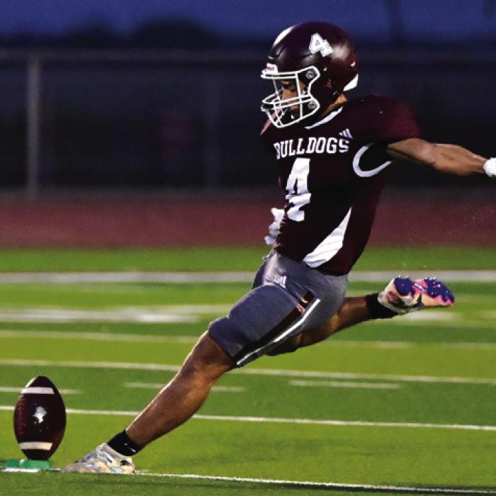 Flatonia’s Jose Maria Garcia, kicks off in the season opener. He nailed three-extra points against Sacred Heart Friday. Photo by Stephanie Steinhauser