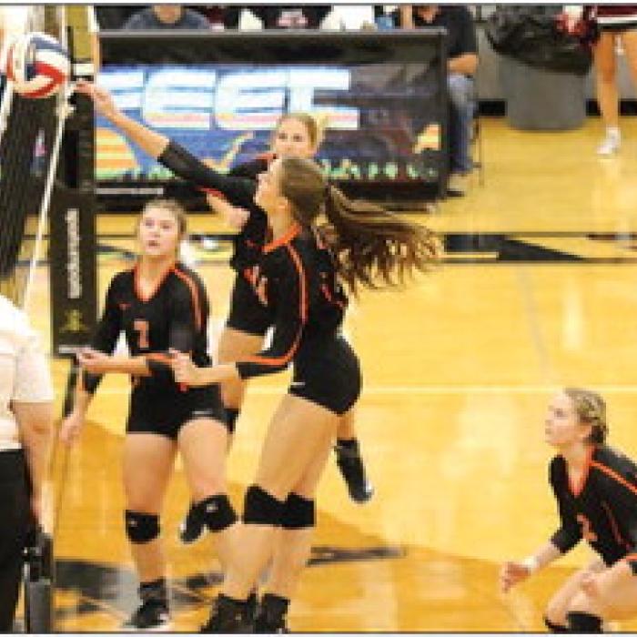 Schulenburg’s Emmrie Marx spikes the ball on Monday’s playoff match. She had a team-high 18 kills. Photo by Audrey Kristynik