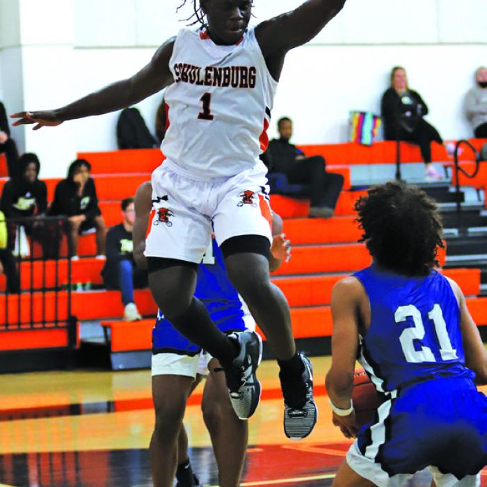Schulenburg’s Rodney Walton leaps to block this shot attempt in action at their home tourney last weekend. Photo by Audrey Kristynik