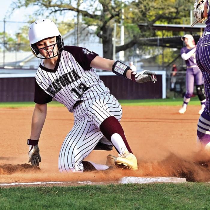 Presley Cliffe slides into third on a triple hit to centerfield Friday night in a district matchup with Shiner. Cliffe knocked in Jalee Trussell to put a run on the board in the first inning. The Flatonia girls lost 18-4.