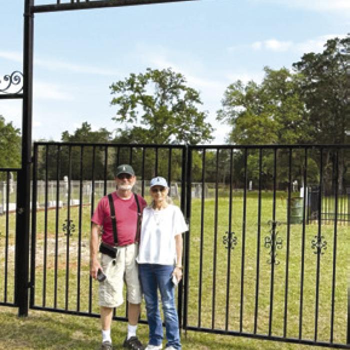 Claude and Sandy Speed at the freshly cleaned Pin Oak Cemetery.