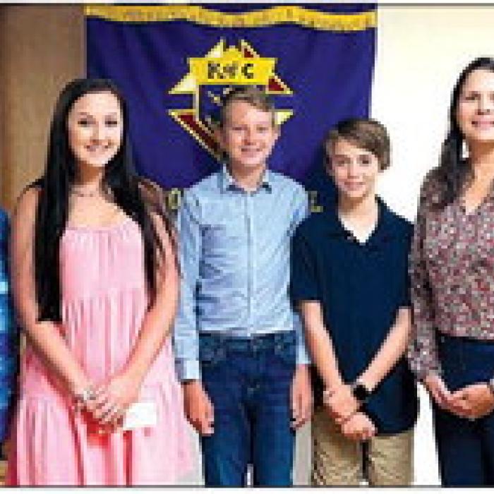 Receiving a Knights of Columbus Scholarship in honor of deceased member Kenneth Jurecka is Blayne Bippert.