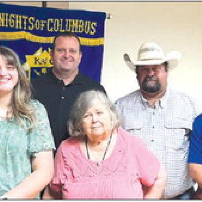 Receiving a Knights of Columbus Scholarship in honor of deceased member Patrick Kalina, Sr. is Hope Kalina.