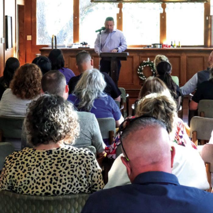 La Grange ISD Superintendent Andy McHazlett speaks to the audience at a presentation organized by supporters of the $90 million school bond. The meeting took place at Frisch Auf! Valley Country Club last Wednesday. Photo by Andy Behlen