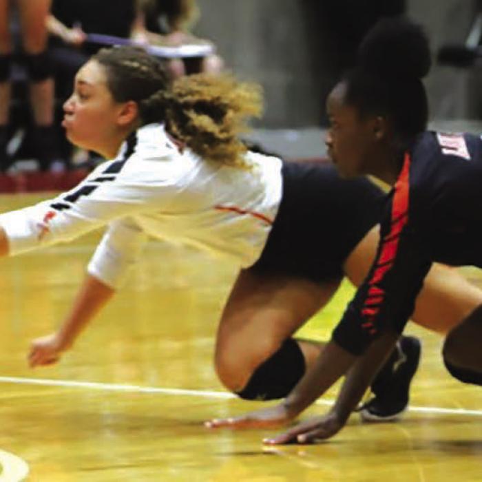 Schulenburg’s Kieryn Adams makes a remarkable one-armed dig in the state semifinal match. Adams was named to the all-state tournament team for her state record 41 digs in the semifinals. Photo by Audrey Kristynik