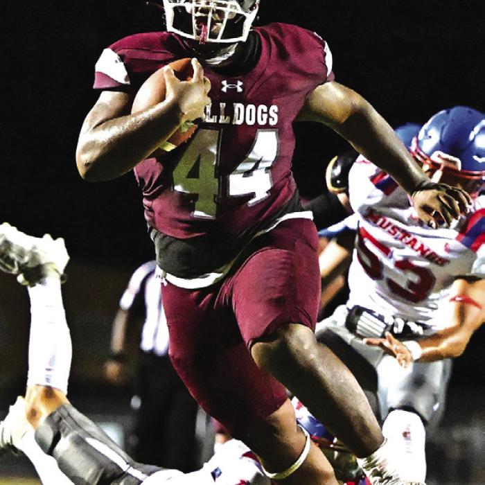 Flatonia High School senior football star Kobe Burton has announced that he has accepted a scholarship offer to play for The University of Texas Permian Basin. Burton ran for 793 yards and 14 touchdowns for the Bulldogs this season and led the team in total tackles with 108. Photo by Stephanie Steinhauser