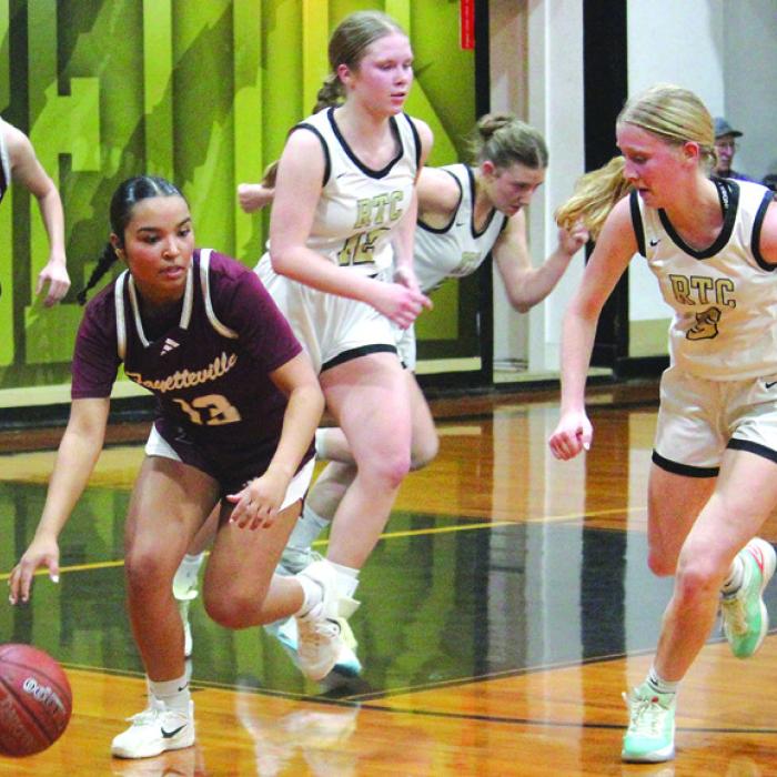Fayetteville’s Devynn Moeckel leads a fast break in last Friday’s game against Round Top Carmine. The Lady Lions are one win away from clinching their first outright district title in eight years. Photo by Jeff Wick