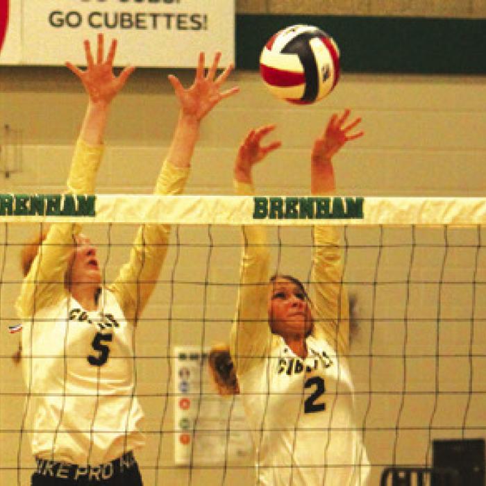 Kaysie Ward and Tess Eilers on a block.