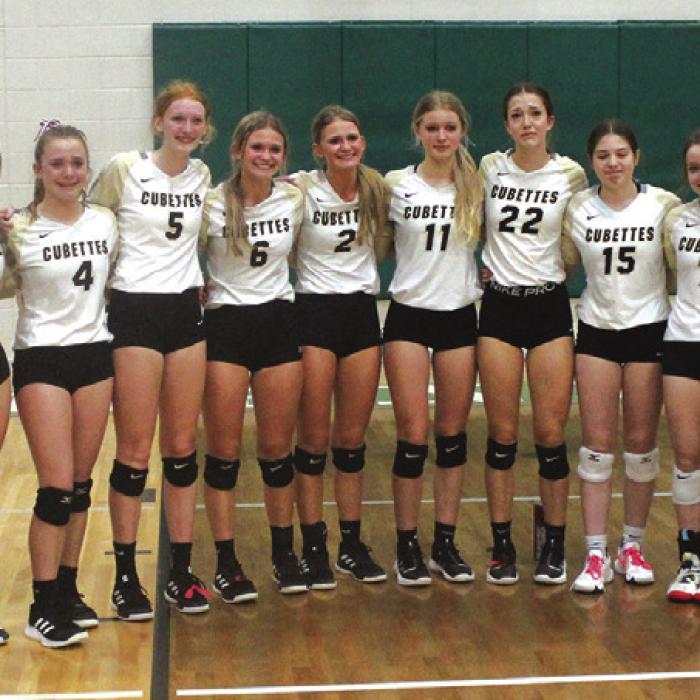 The members of the Round Top-Carmine volleyball team pose with their regional runner-up trophy after Saturday’s loss to Neches. Photos by Jeff Wick