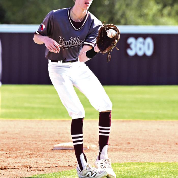 Senior Blake Kessler makes a catch at shortstop for The Flatonia Bulldogs in Thursday’s game with East Bernard. Photos by Stephanie Steinhauser