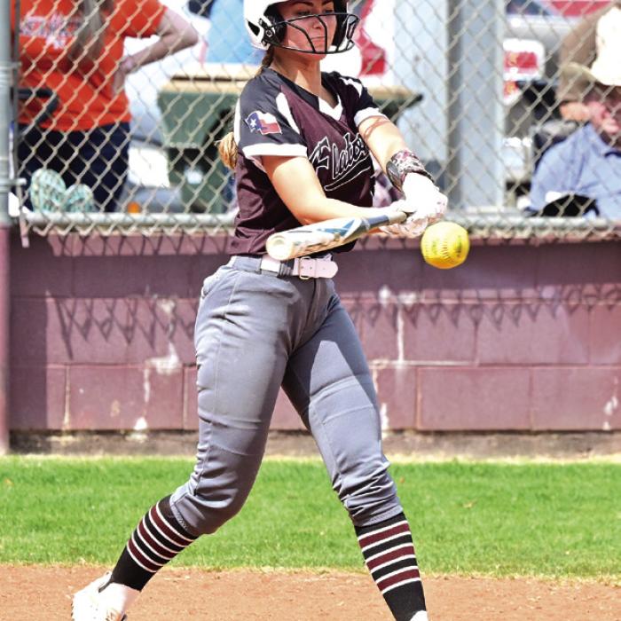 Sadie Noska singles for the Lady Bulldogs in Saturday’s win over Luling in the Mike Schultz tournament held last weekend in Flatonia.