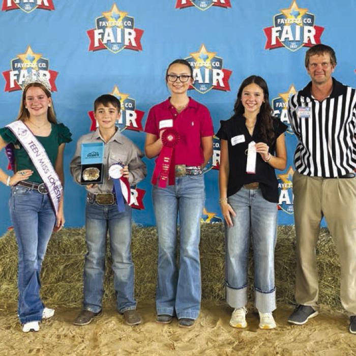 Overall High Point Winners, Intermediate: Kylee Hoffmann-Teen Miss Lone Star State agHERculture, Crockett Guenther, Tatum Fritsch, Alexis Berckenhoff, and sponsor H-E-B representative Justin Dahse.