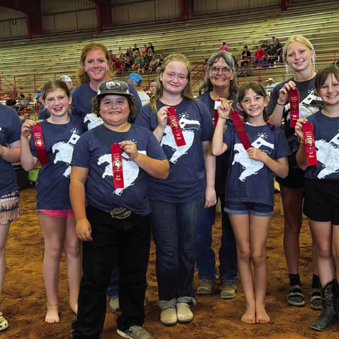 The Texas Tornadoes with their ribbons in Athens.