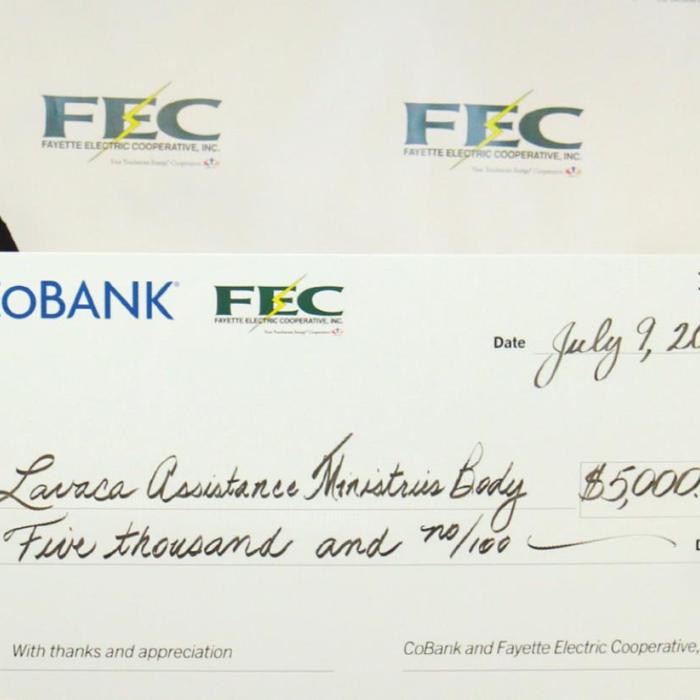 The Lavaca Assistance Ministry Body (LAMB) received a $5,000 grant from FEC and CoBank. Pictured are left to right; FEC General Manager Gary Don Nietsche and LAMB Maintenance Director Harry Cull.