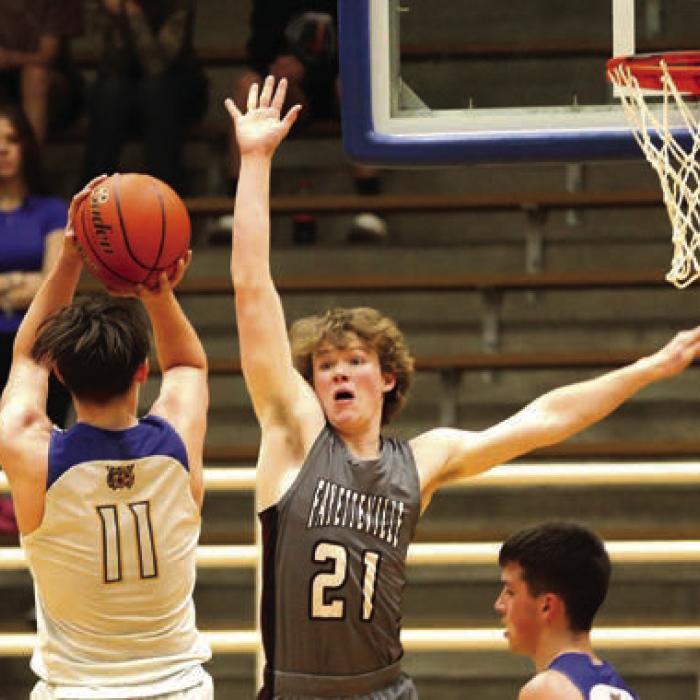 Lions Roar Their Way to State Basketball Tournament