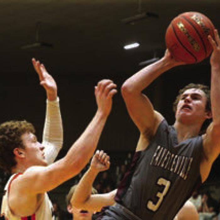 Lions Roar Their Way to State Basketball Tournament