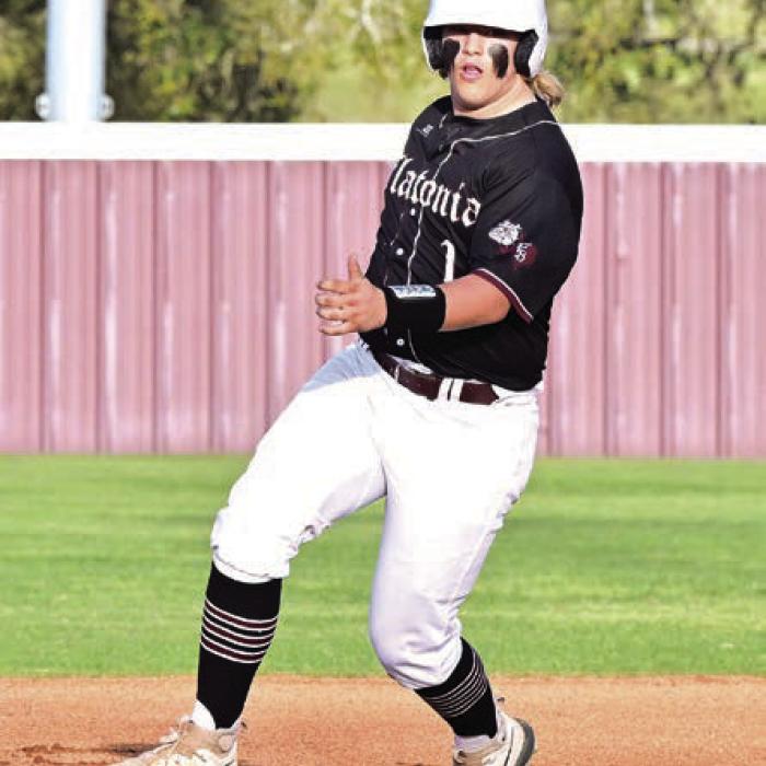 Senior Tripp Bowling reaches second on a double hit to deep left in Friday’s 5-0 win over Tidehaven at their home tournament. The Bulldogs also beat St. Paul 5-4 but lost to East Bernard 6-2. Photo by Stephanie Steinhauser