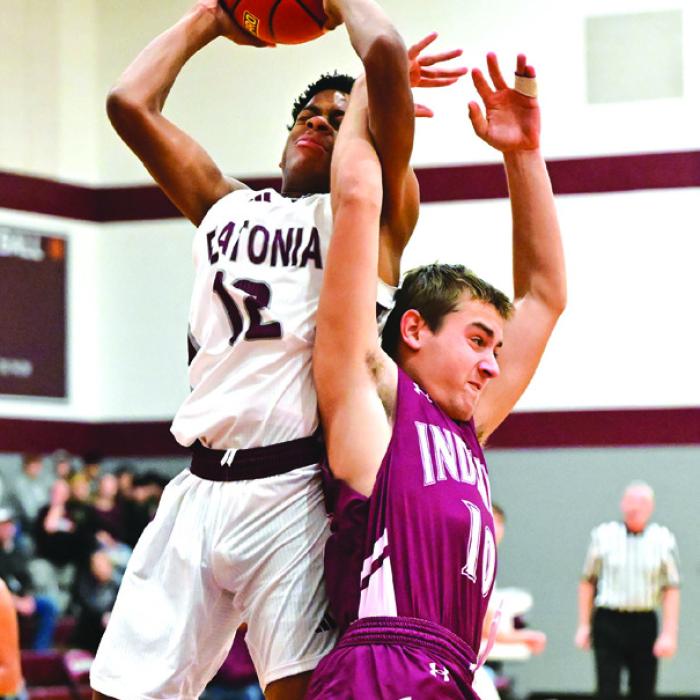 Flaronia’s Jaylon Anderson gets tangled up with a Ganado player Friday as he is shooting for two. Photo by Stephanie Steinhauser