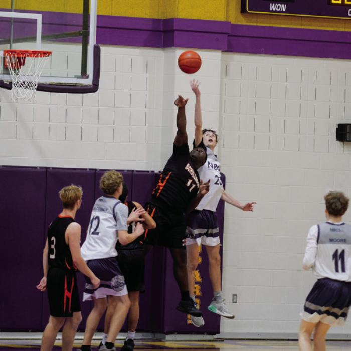 Schulenburg’s Cootie Ellison (11) fights for a rebound with a player from Northern Beaches Christian School, one of two Australian teams that competed in the Schmeckenfest Tournament.