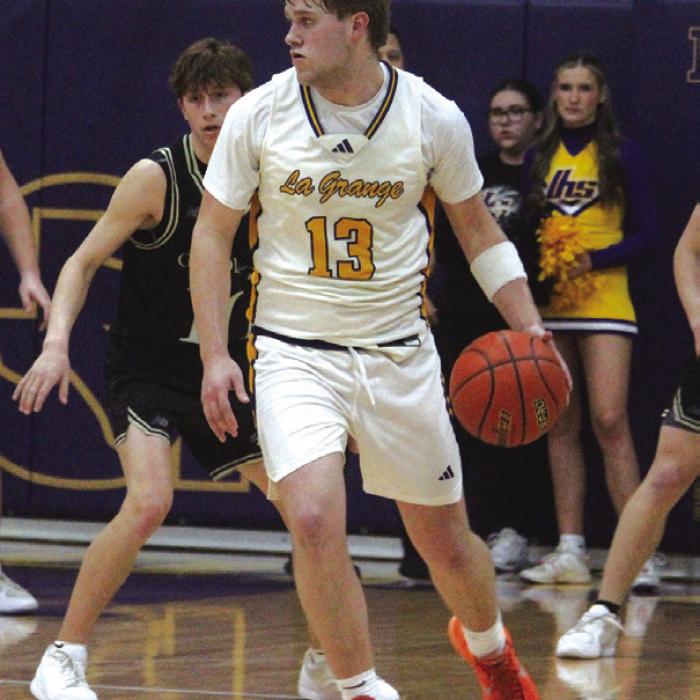 La Grange’s Conner Brooks dribbles the ball during Tuesday’s game. Photo by Jeff Wick