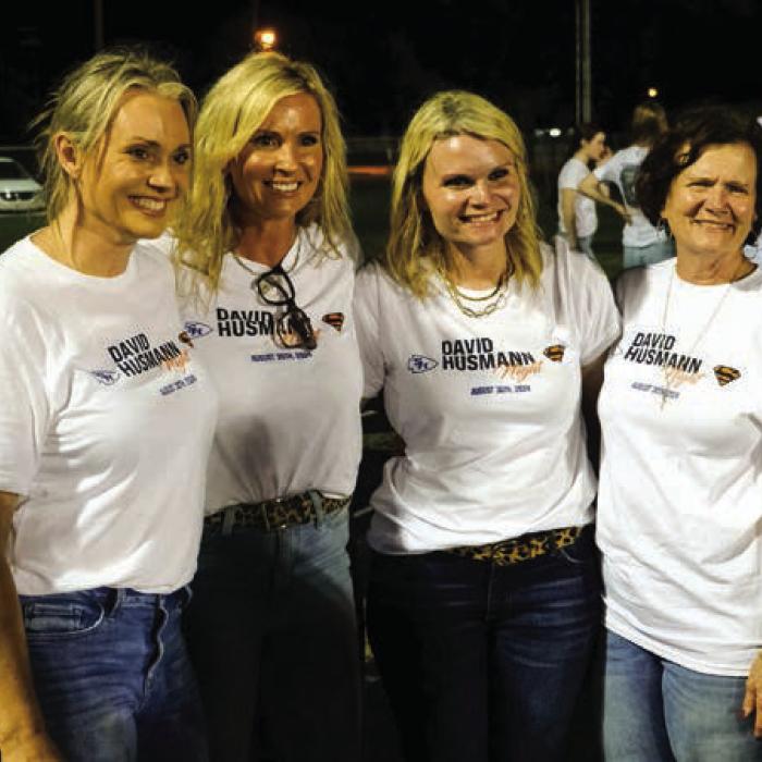 Schulenburg and Sacred Heart honored their former head coach, David Husmann, during the game Friday night. Pictured are (from left) his daughters Kristin Husmann Fisher, Angie Husmann Embry, Bonnie Husmann Seydler and widow Karen Husmann.