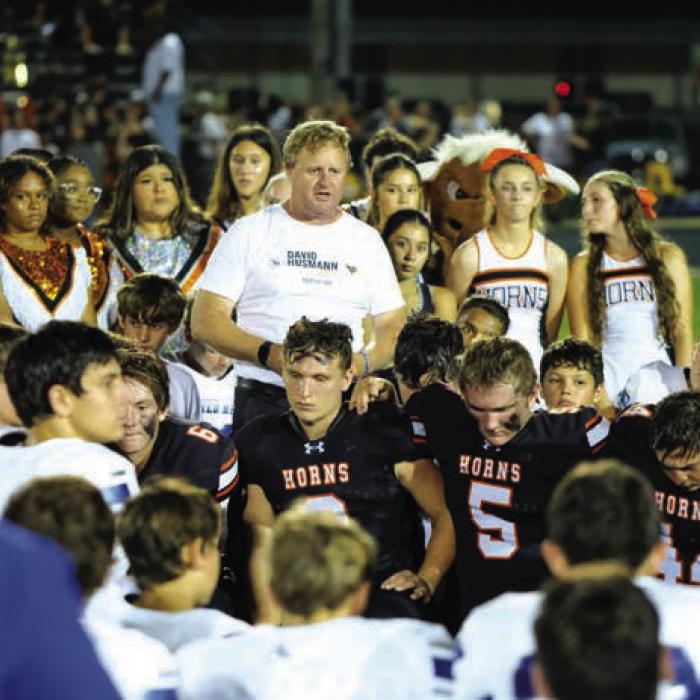 After the game, Sacred Heart head coach Alex Seydler called both teams into a huddle and thanked them for honoring his late father-in-law, David Husmann, who died almost four years ago. Husmann coached the Shorthorns to two state titles in the 1990s. Just before he died in 2020, Husmann took the head coaching job at Hallettsville Sacred Heart.