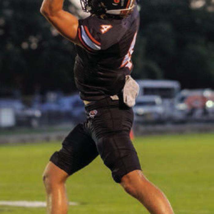 Jayse Janda leaps to snag a pass. Friday.
