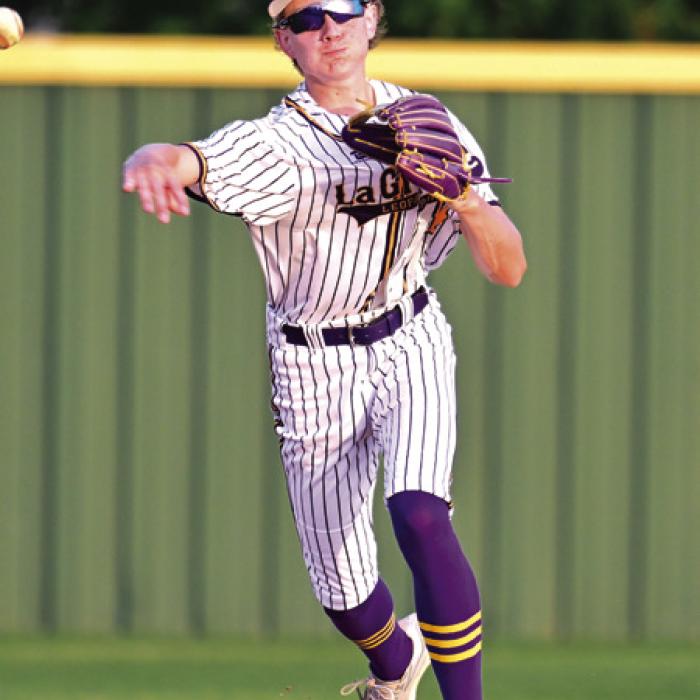 Shortstop Tristin Ulrich fields a ground ball and throws to Kyler Lamza at first for the out.