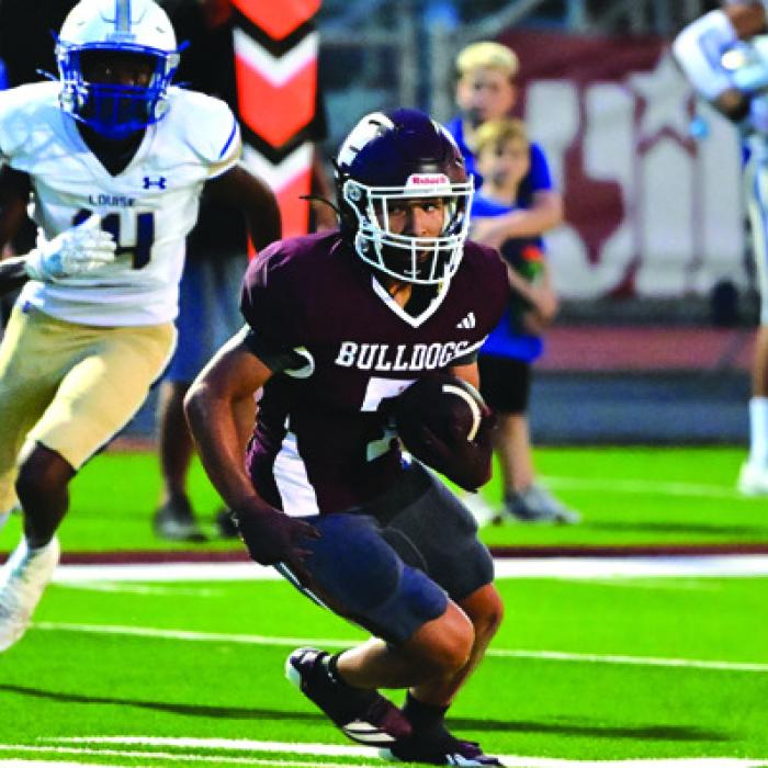 Flatonia’s Zayden Perez runs the football in Friday’s game. Photo by Stephanie Steinhauser