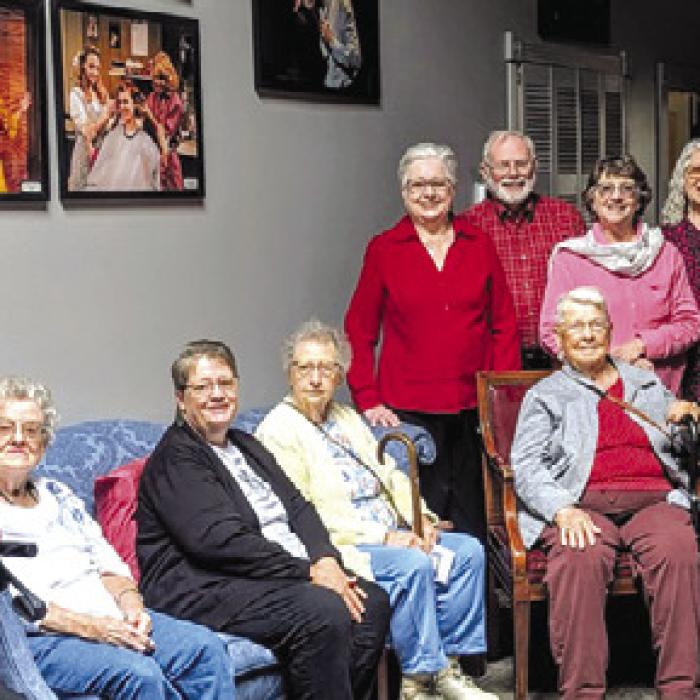 Those in attendance gathered for a photo before the performance. Seated from left to right: Gladys Teinert, Jo Ann Mueller, Margaret Roscher, Audrey Huenefeld, Beverly Ullrich, Carol Svrcek and Helen Oestreich; standing from left: Marilyn Spillane, Mary Vasek, Liz Tannler, Judy Zuhn, Larry Jackson, Susie Jackson, Ginger Friemel, Marilyn Strmiska, Becky Snyder, Janet Moerbe and Phil Oestreich.